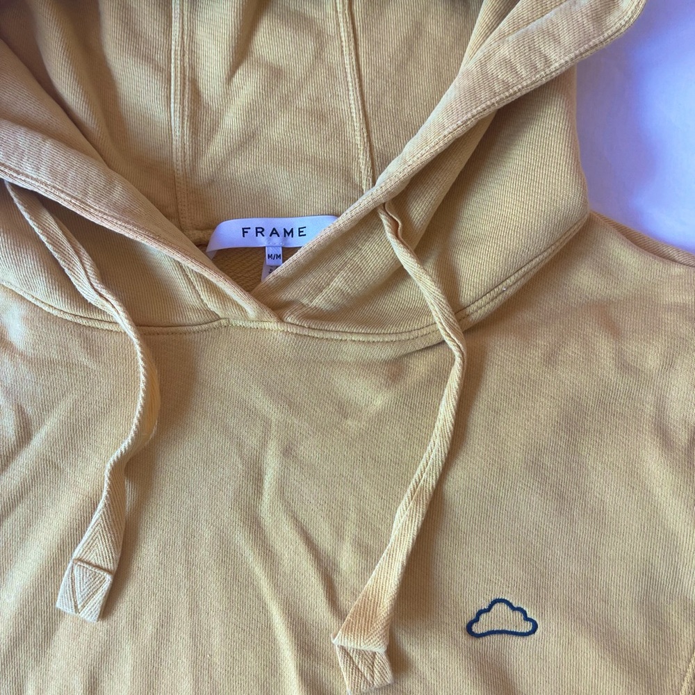 Bright yellow Frame hoodie with blue cloud